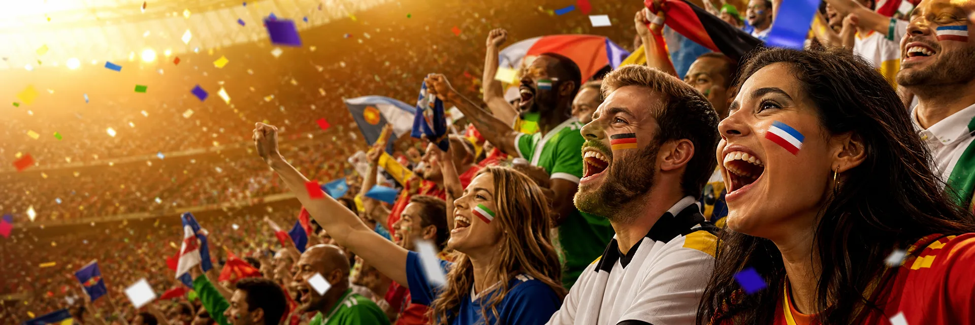 Supporters wearing multi-colour face paint at a sports event